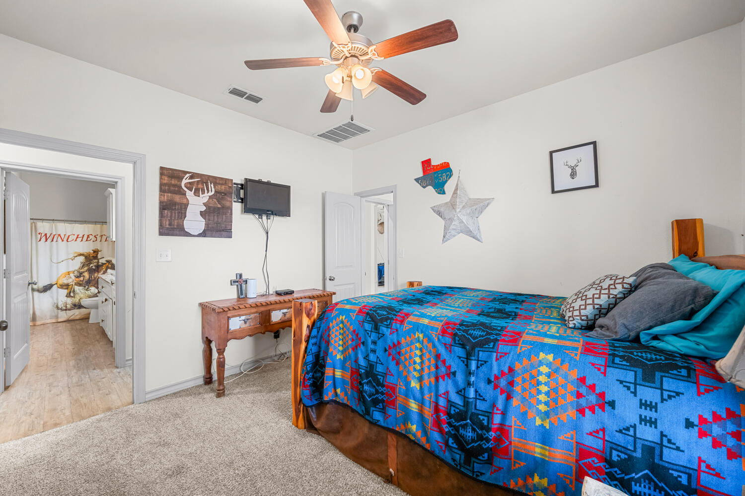 542 Nora Road Wilson, TX 79381 - Photo 30 of 42 a bedroom with bed and window