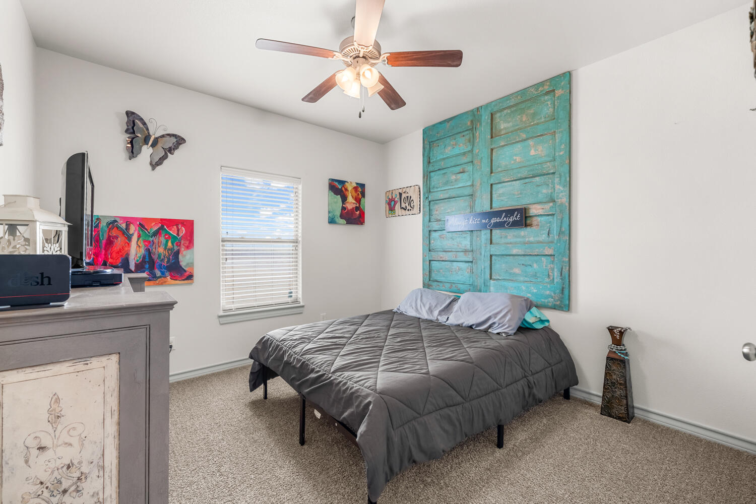 542 Nora Road Wilson, TX 79381 - Photo 32 of 42 a bedroom with a bed and a window