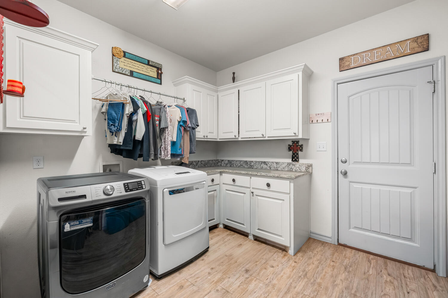 542 Nora Road Wilson, TX 79381 - Photo 36 of 42 a view of a kitchen with washer and dryer