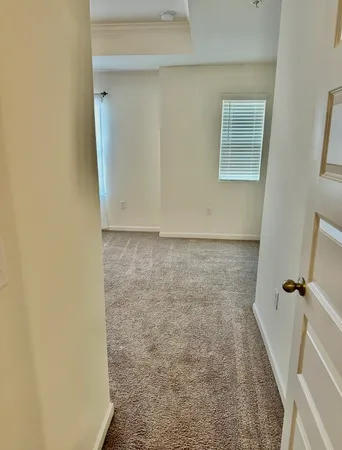 a bathroom with a granite countertop shower
