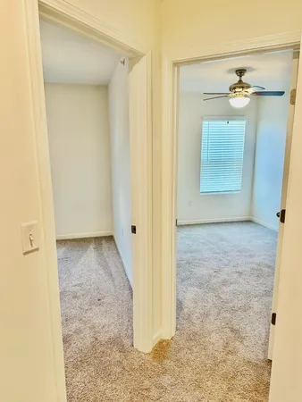 a view of entryway with wooden floor
