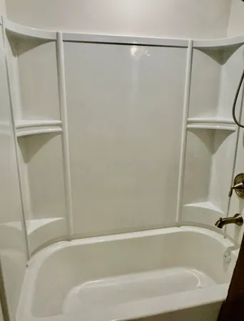 a bathroom with a sink and mirror