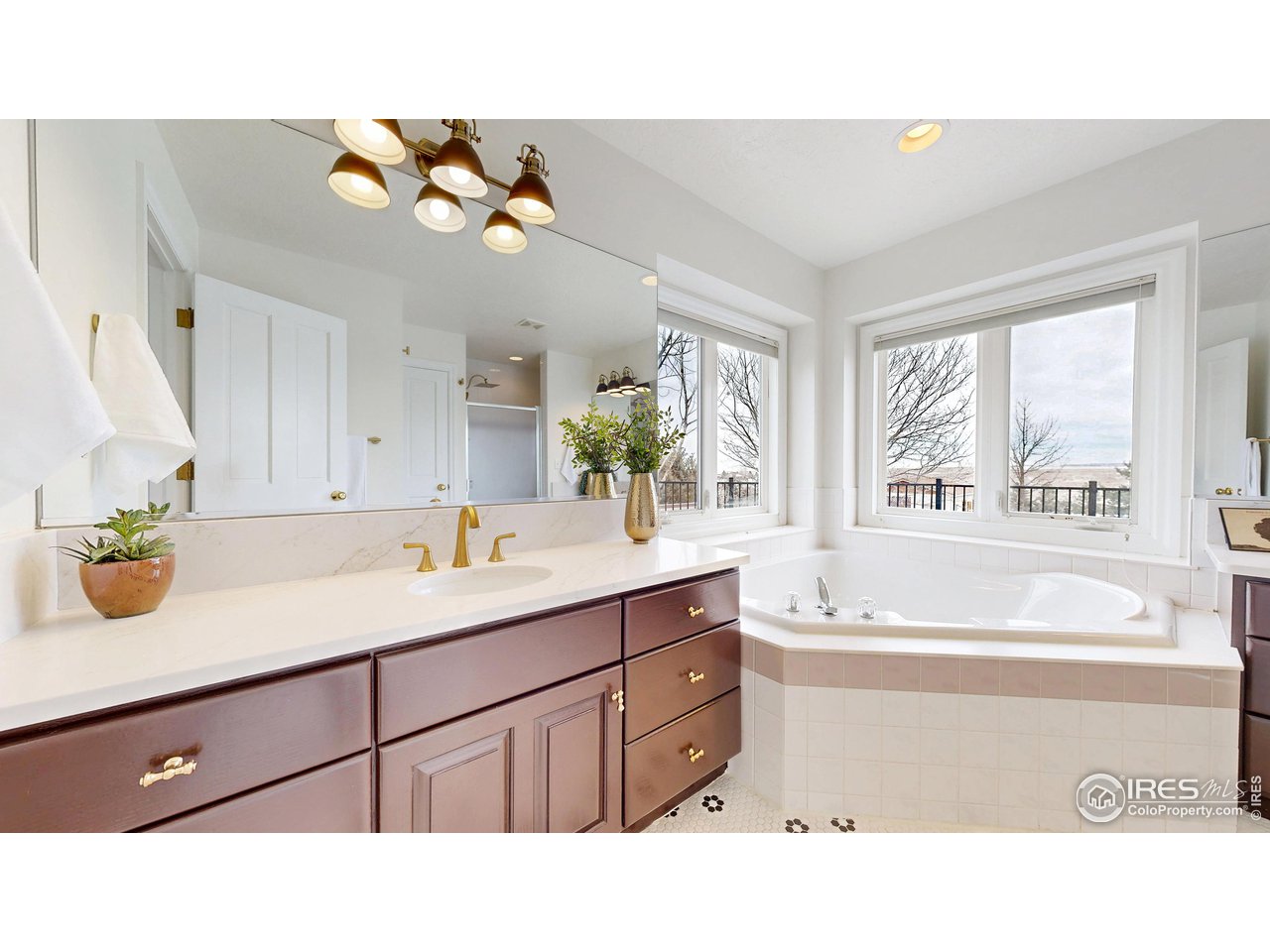 7904 Windsong Road Windsor, CO 80550 - Photo 16 of 40 Primary Bath