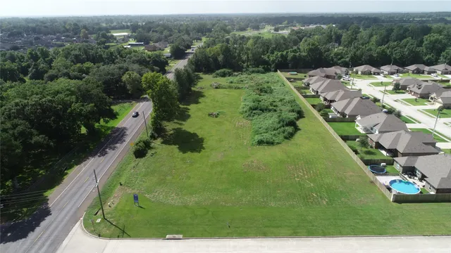 a view of a garden with a lake