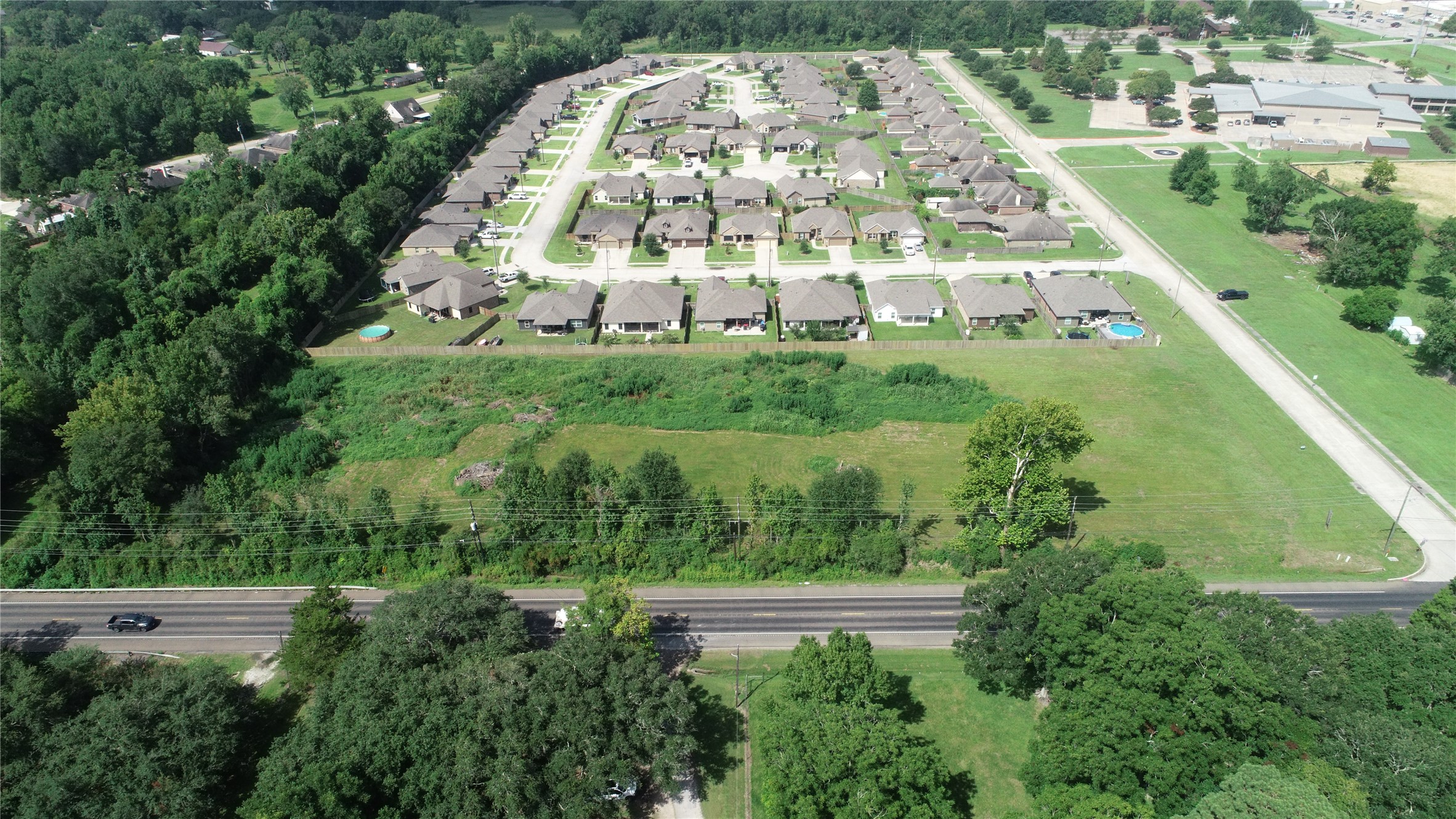 0 South Winfree Street Dayton, TX 77535 - Photo 4 of 14 a view of a multi story building
