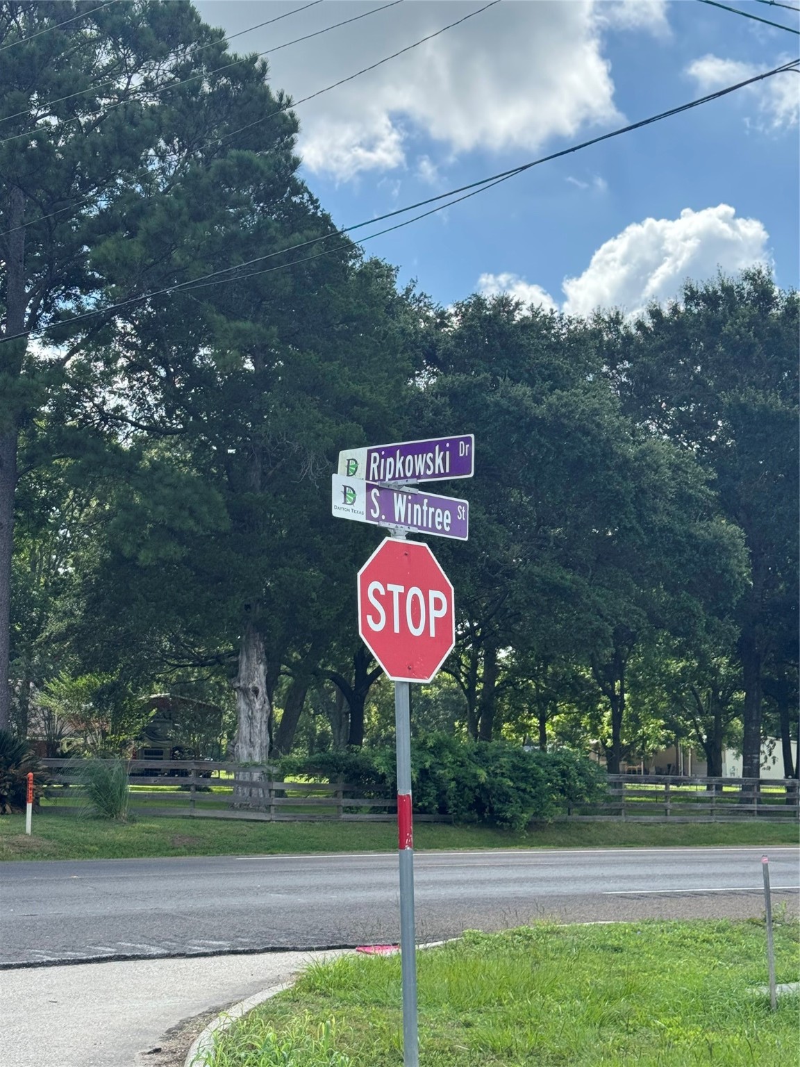 0 South Winfree Street Dayton, TX 77535 - Photo 8 of 14 a sign that is on the side of a road