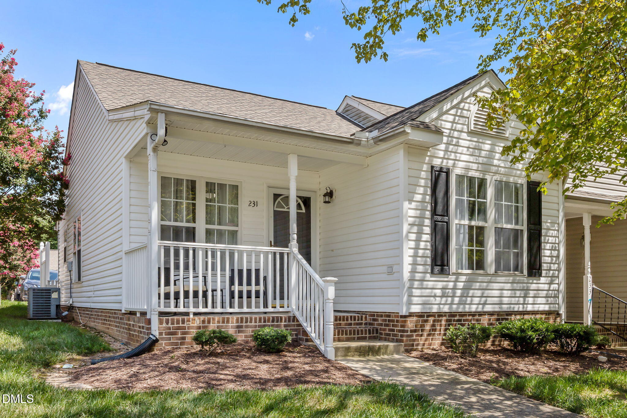 231 Highgate Circle Wake Forest, NC 27587 - Photo 1 of 61 a front view of a house with garden