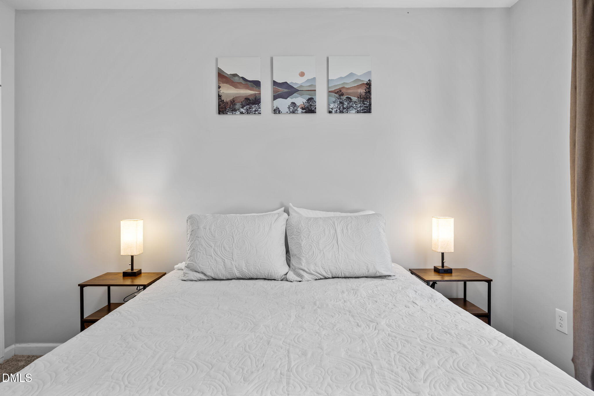 231 Highgate Circle Wake Forest, NC 27587 - Photo 38 of 61 a bedroom with a bed and lamp