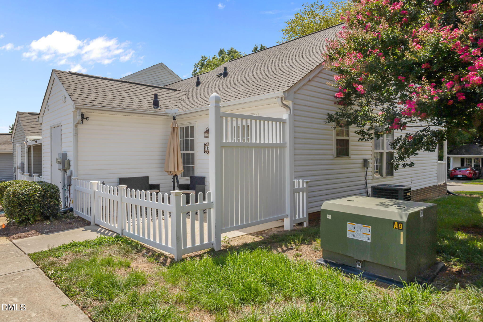 231 Highgate Circle Wake Forest, NC 27587 - Photo 3 of 61 a view of a house with a small yard and wooden fence
