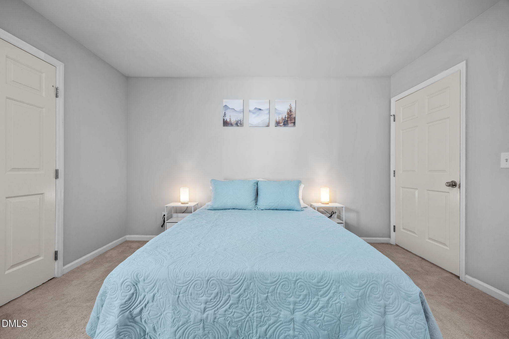 231 Highgate Circle Wake Forest, NC 27587 - Photo 39 of 61 a bedroom with a bed and a night stand