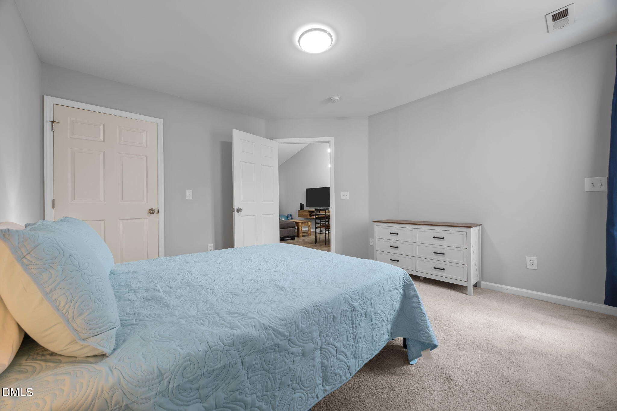 231 Highgate Circle Wake Forest, NC 27587 - Photo 42 of 61 a room with a bed and a view of bedroom