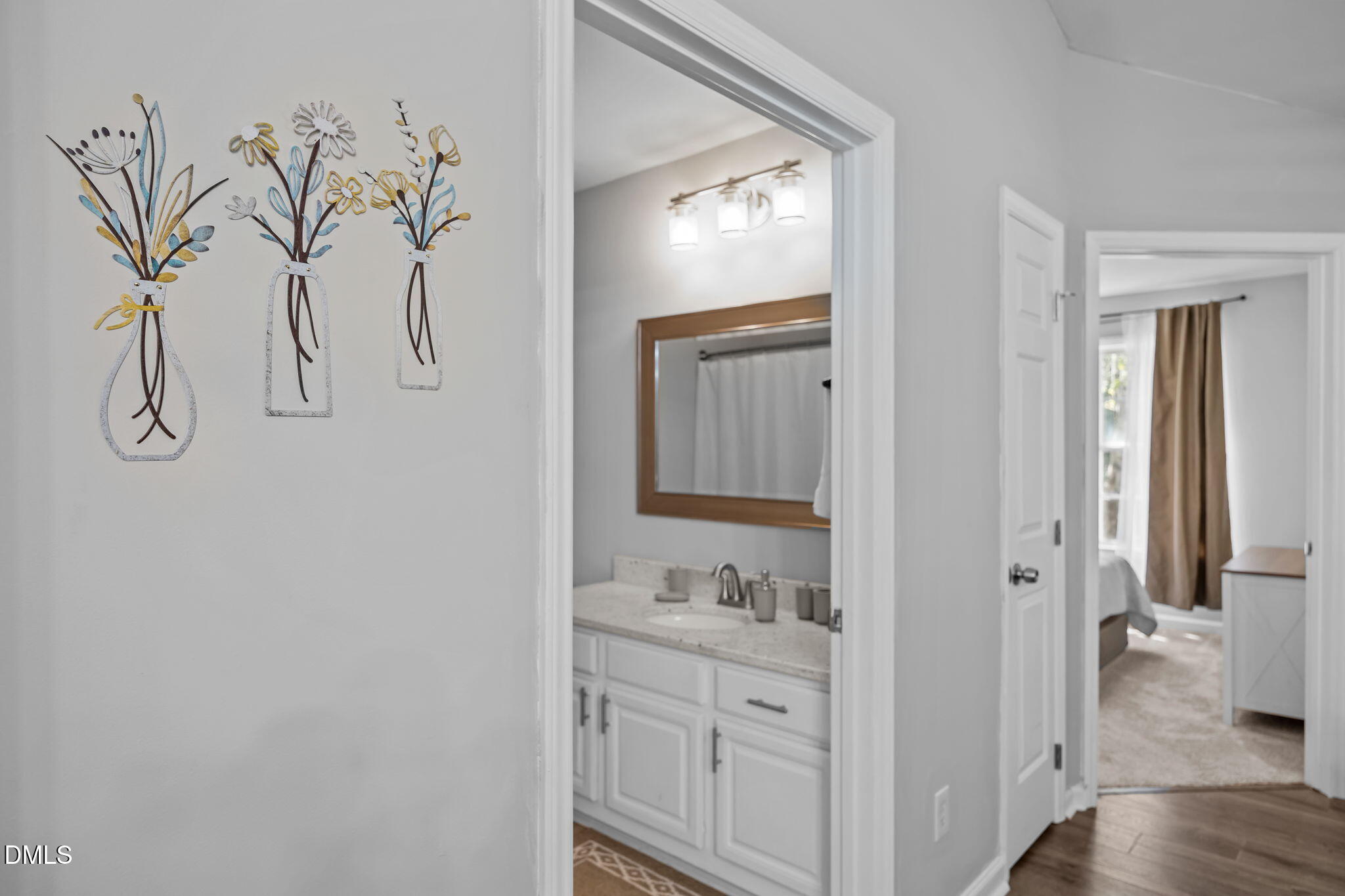 231 Highgate Circle Wake Forest, NC 27587 - Photo 49 of 61 a bathroom with a granite countertop sink a mirror and shower view