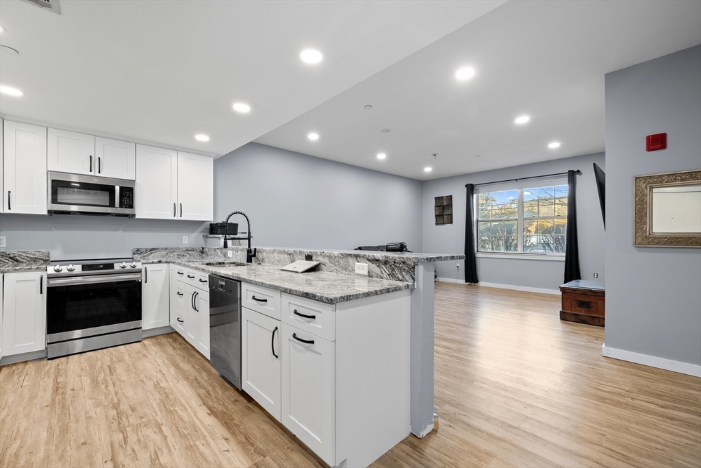 1 Powder Mill Square, Unit 102 Andover, MA 01810 - Photo 3 of 30