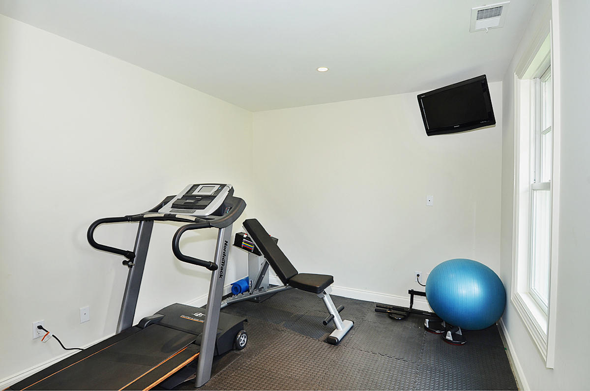 277 Country Club Road New Canaan, CT 06840 - Photo 18 of 29 a view of a room with gym equipment