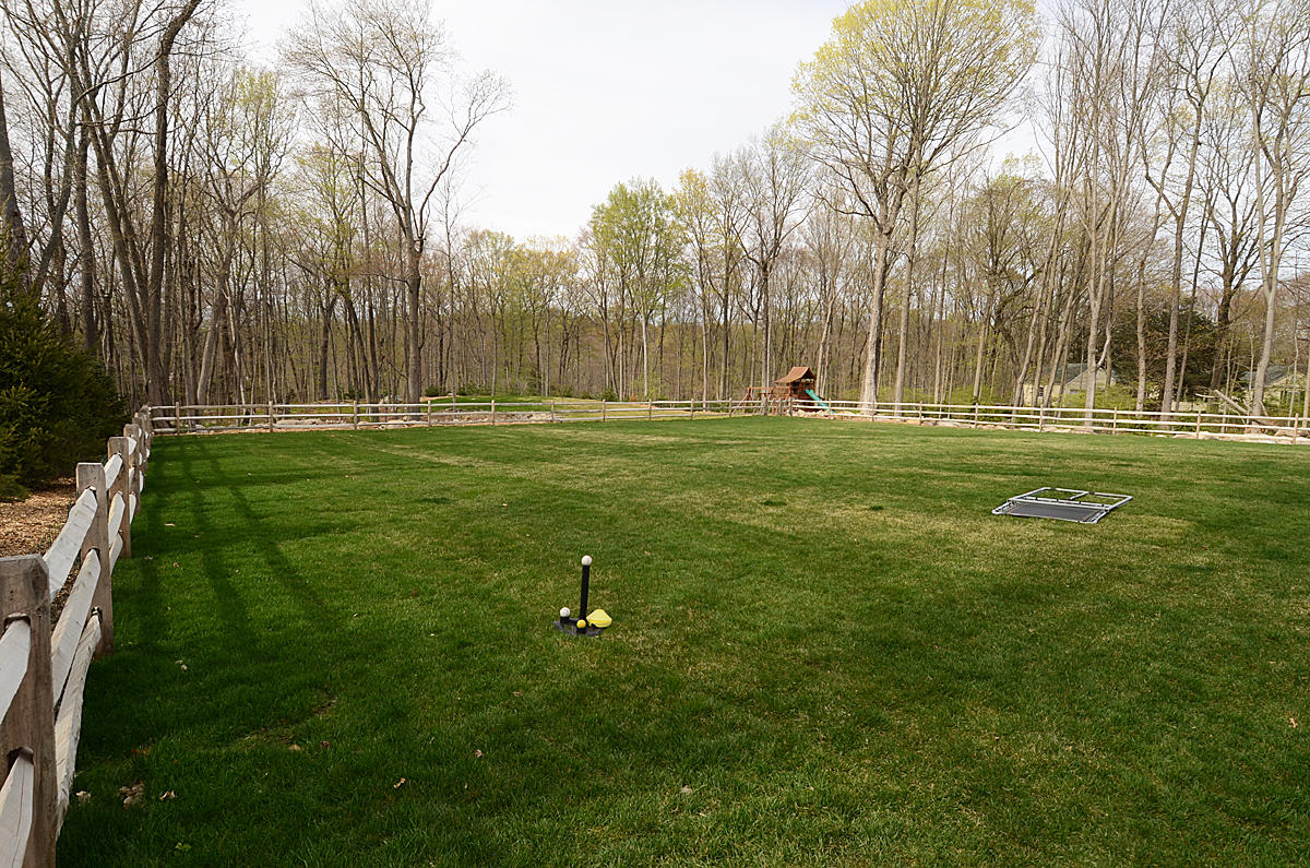 277 Country Club Road New Canaan, CT 06840 - Photo 25 of 29 a view of a park with large trees