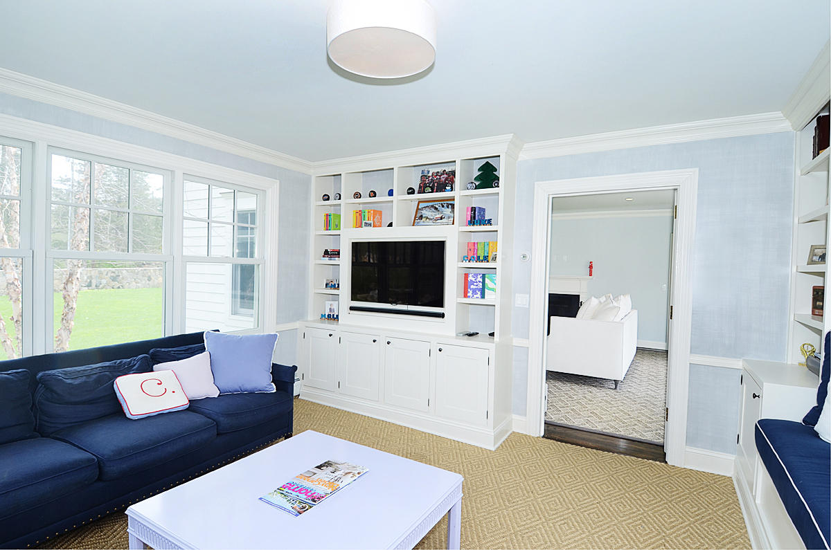 277 Country Club Road New Canaan, CT 06840 - Photo 6 of 29 a living room with furniture and a flat screen tv