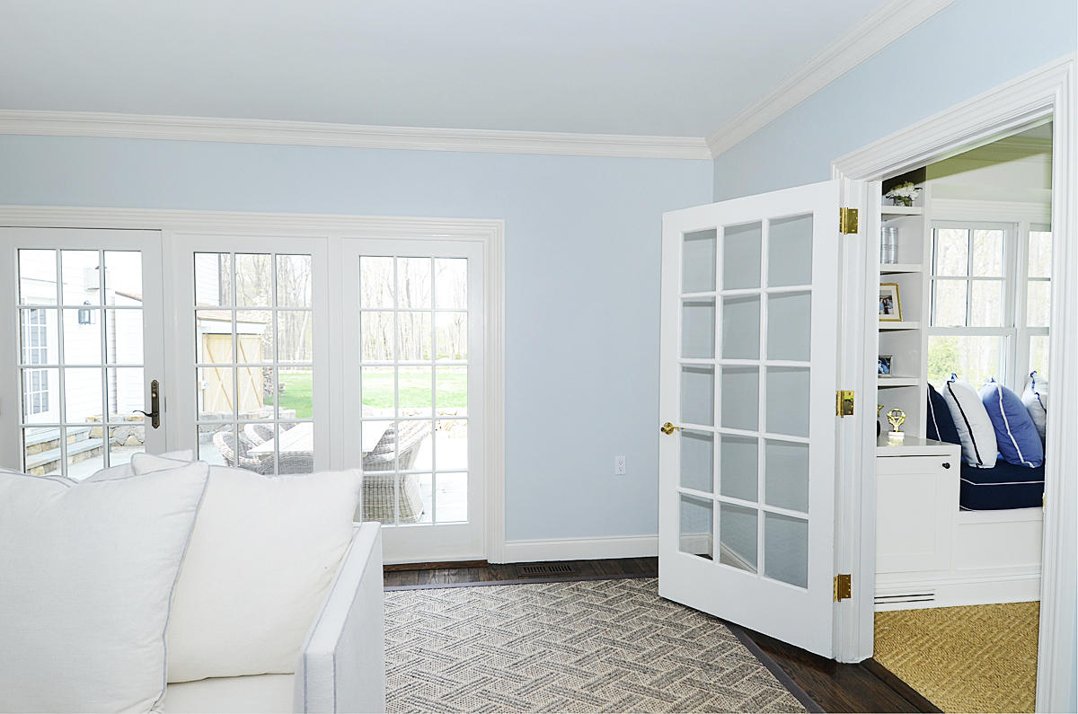 277 Country Club Road New Canaan, CT 06840 - Photo 8 of 29 a bedroom with a bed and wooden floor