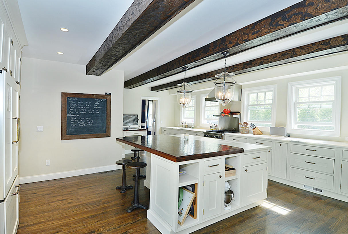 277 Country Club Road New Canaan, CT 06840 - Photo 10 of 29 a kitchen with sink stove and cabinets