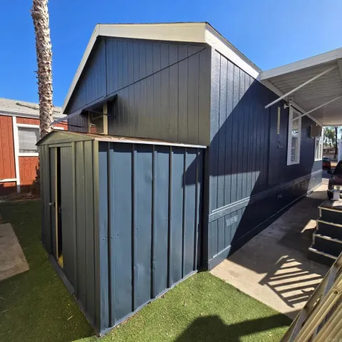a view of a swimming pool with a yard