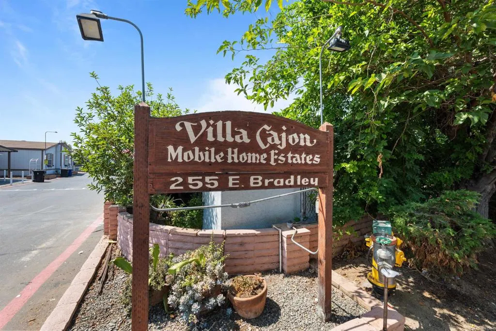 255 East Bradley Avenue, Unit SPC 79 El Cajon, CA 92020 - Photo 19 of 22 a sign on the side of a road