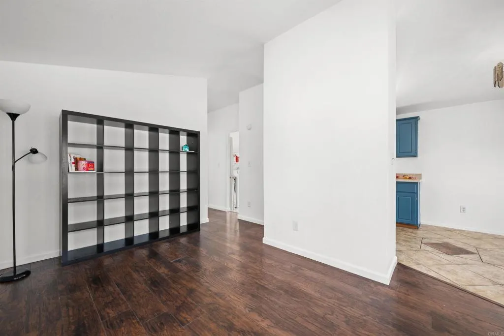 255 East Bradley Avenue, Unit SPC 79 El Cajon, CA 92020 - Photo 8 of 22 a view of a livingroom with wooden floor