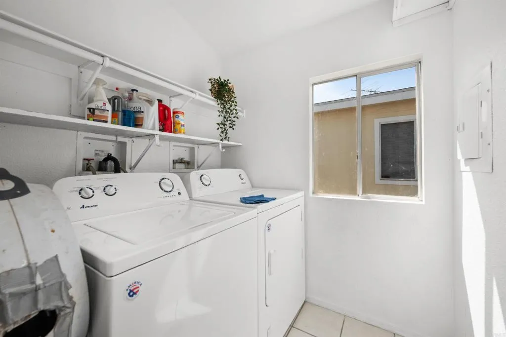255 East Bradley Avenue, Unit SPC 79 El Cajon, CA 92020 - Photo 9 of 22 a utility room with dryer and washer