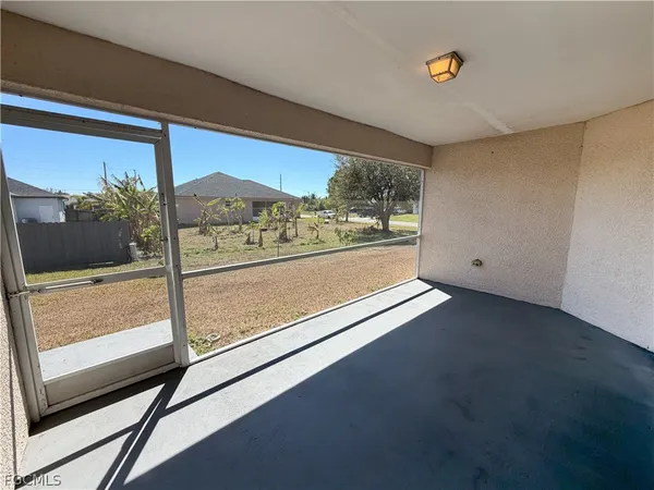 a view of a room with yard from a window