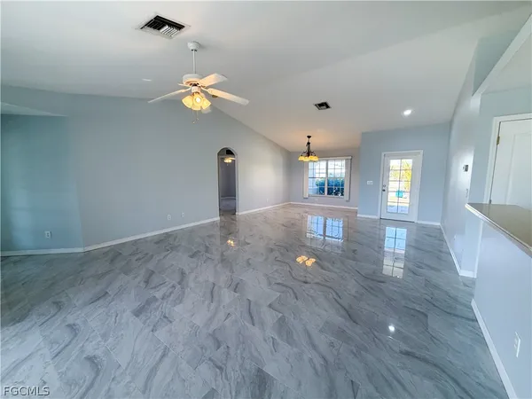 a view of an empty room and window