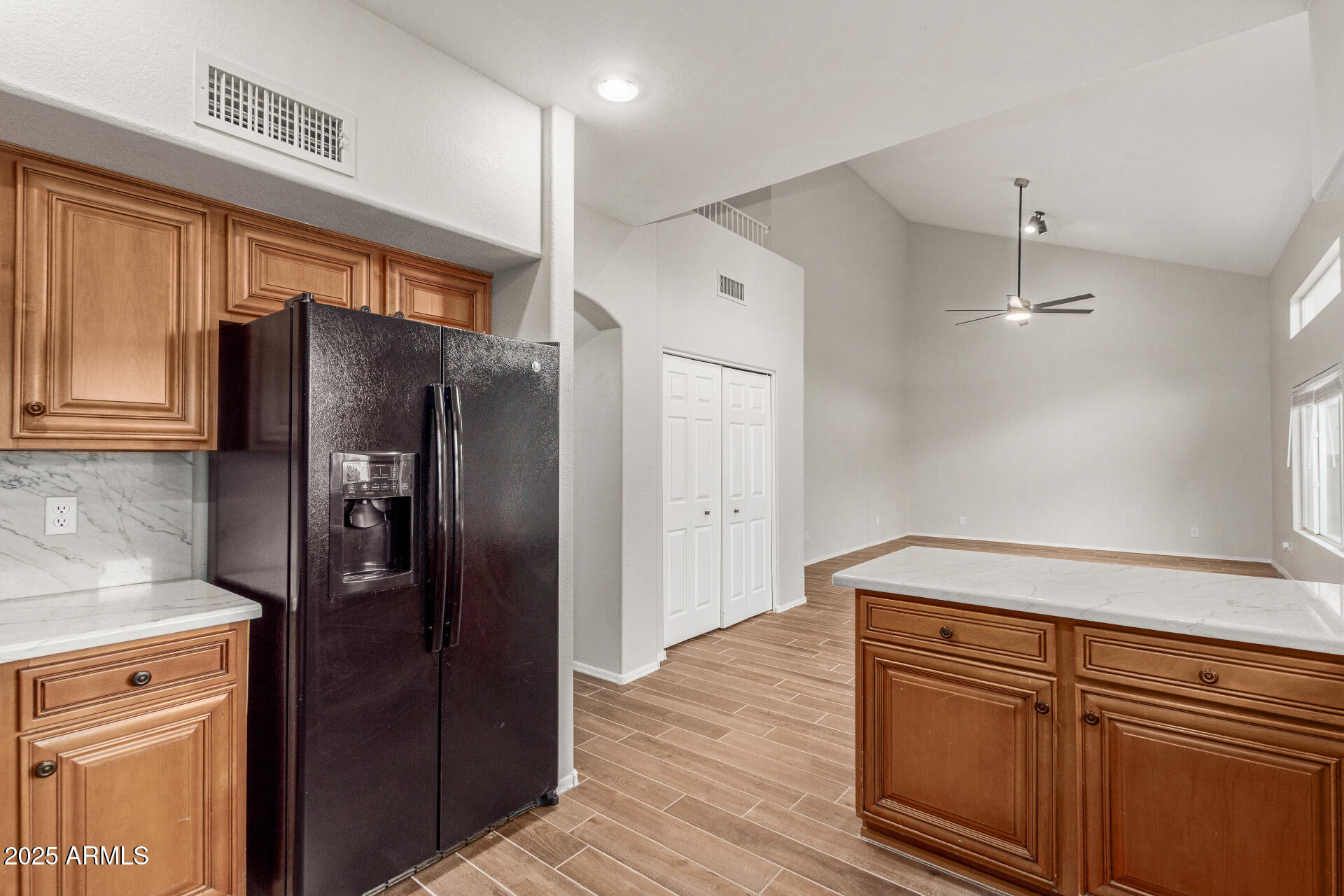 4522 East Rowel Road Phoenix, AZ 85050 - Photo 22 of 49 a kitchen with stainless steel appliances granite countertop a refrigerator and a sink