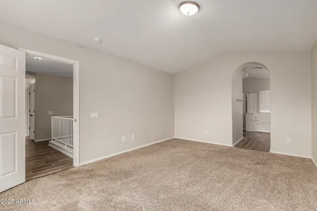 an empty room with a bathroom