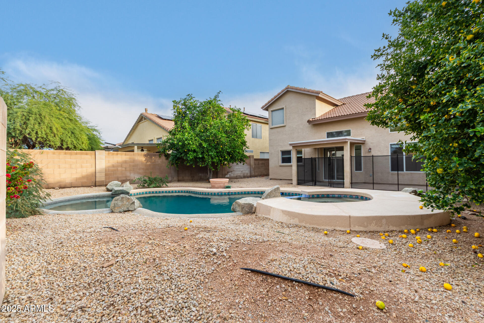 4522 East Rowel Road Phoenix, AZ 85050 - Photo 45 of 49 a front view of a house with garden