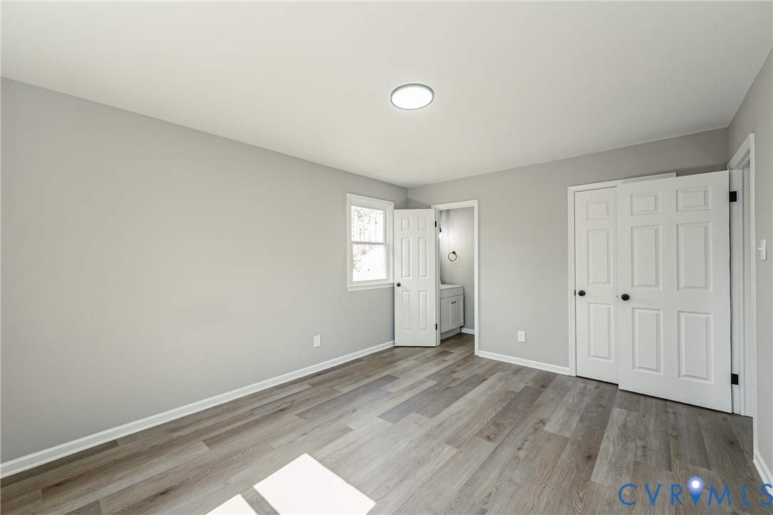 15412 Exter Mill Road Chesterfield, VA 23838 - Photo 53 of 66 Unfurnished bedroom featuring ensuite bath, light