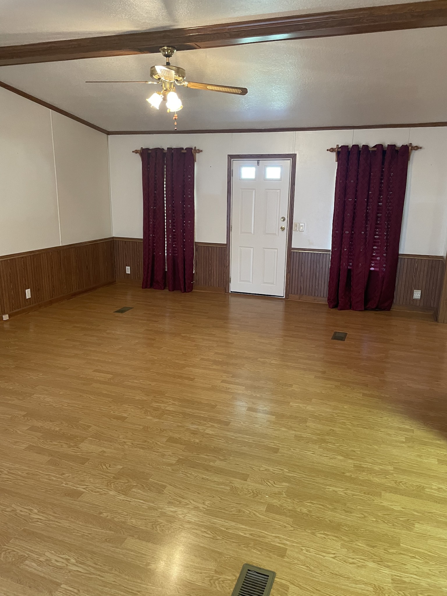 452 Chaffin Road Lafayette, TN 37083 - Photo 3 of 14 a view of an empty room with window and cabinet