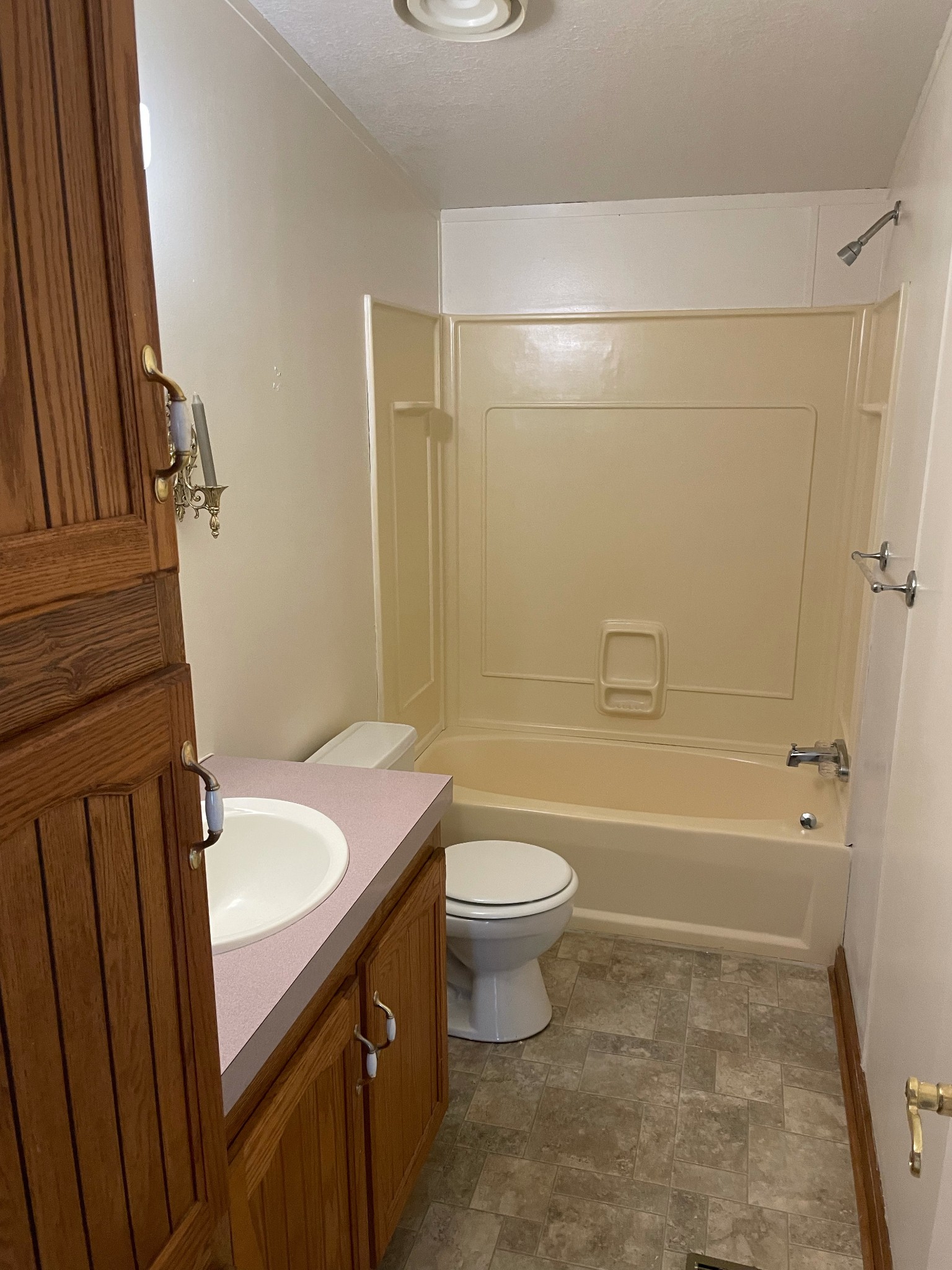 452 Chaffin Road Lafayette, TN 37083 - Photo 9 of 14 a bathroom with a sink a toilet and shower