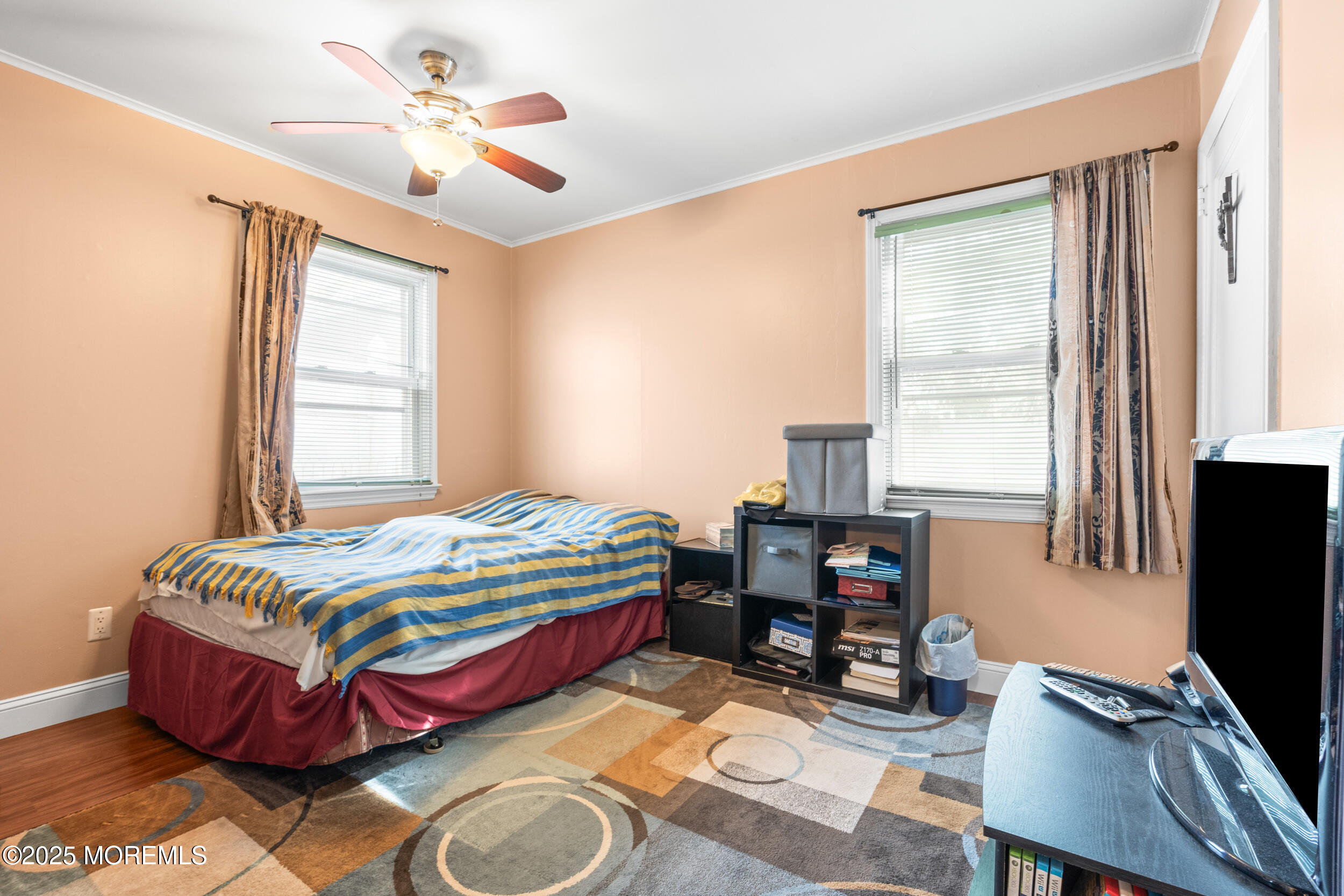 185 Pinecrest Road Oakhurst, NJ 07755 - Photo 15 of 23 a bedroom with a bed work place and a desk