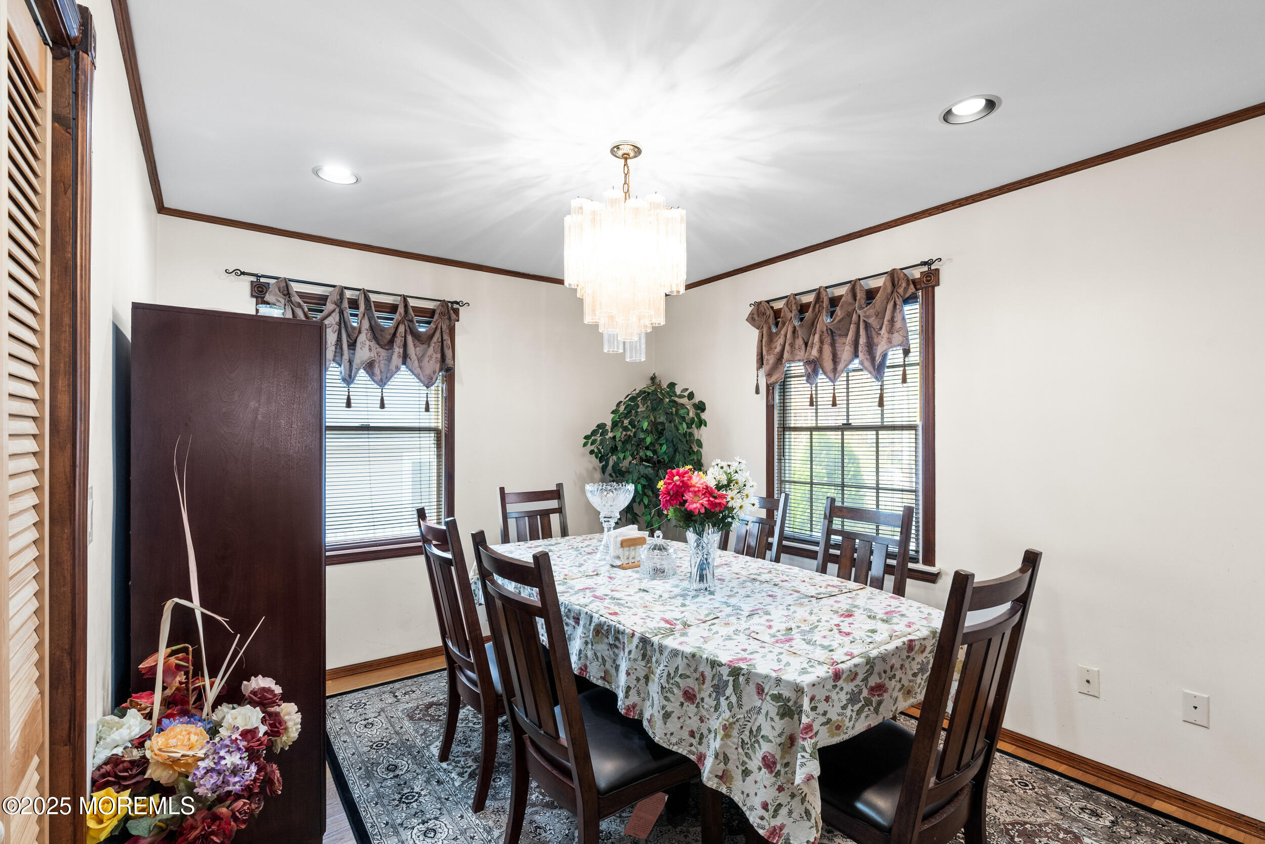 185 Pinecrest Road Oakhurst, NJ 07755 - Photo 23 of 23 a dining room with furniture window and wooden floor