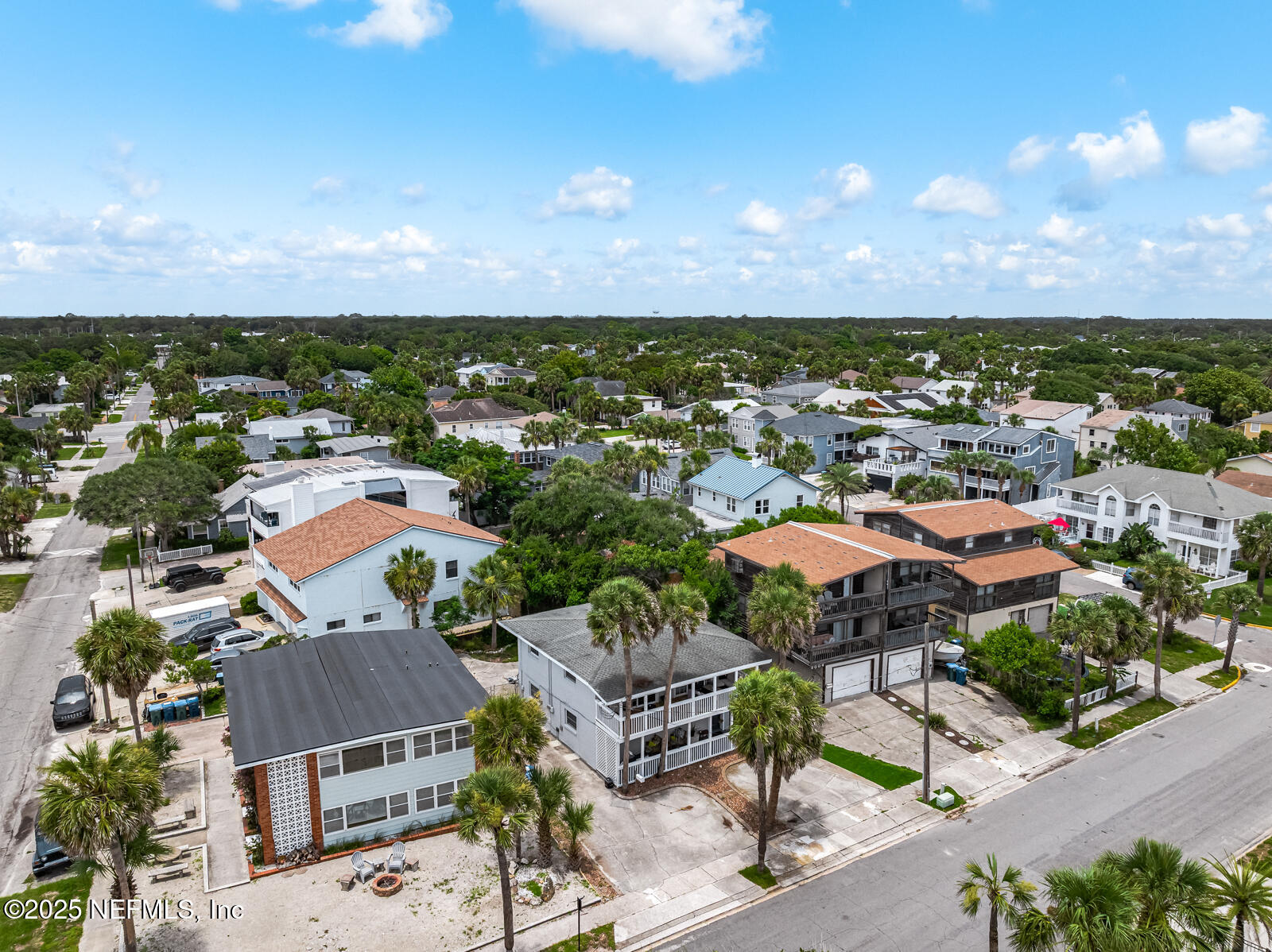 2016 First Street Neptune Beach, FL 32266 - Photo 8 of 17 an aerial view of residential houses with outdoor space and a lake view