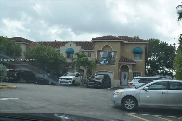 a car parked in front of a house