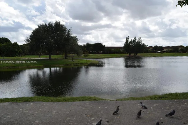 $445,000 | 6970 Northwest 174th Terrace, Unit 404, Hialeah, FL 33015