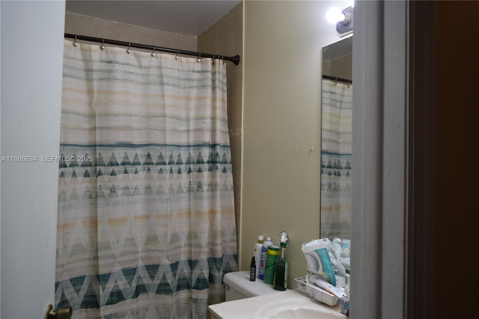 6970 Northwest 174th Terrace, Unit 404 Hialeah, FL 33015 - Photo 10 of 20 a bathroom with a shower