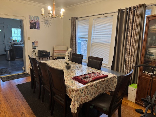 5829 North Washtenaw Avenue Chicago, IL 60659 - Photo 15 of 39 a dining room with furniture and window