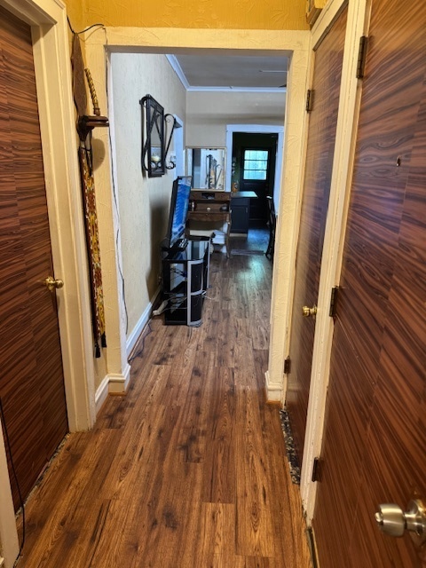 5829 North Washtenaw Avenue Chicago, IL 60659 - Photo 28 of 39 a view of a hallway with wooden floor and stairs