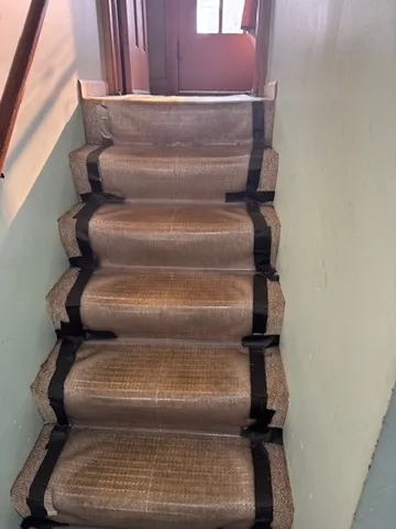 a bathroom with a bathtub and a toilet