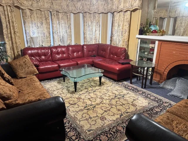 a living room with furniture and a couch