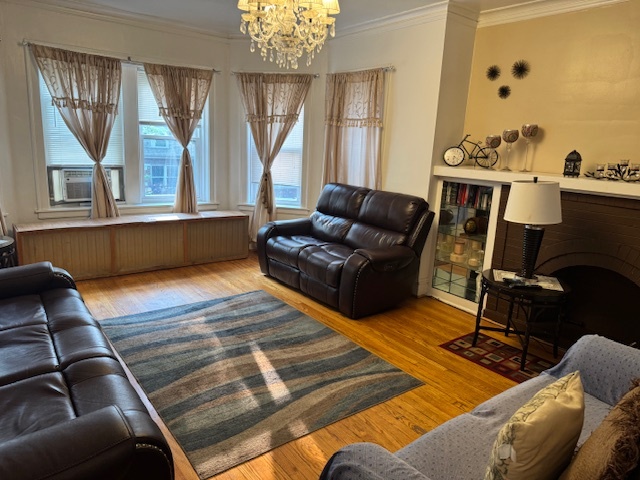 5829 North Washtenaw Avenue Chicago, IL 60659 - Photo 4 of 39 a living room with furniture window and wooden floor