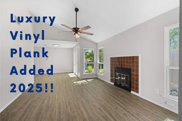 a view of livingroom with furniture and fireplace