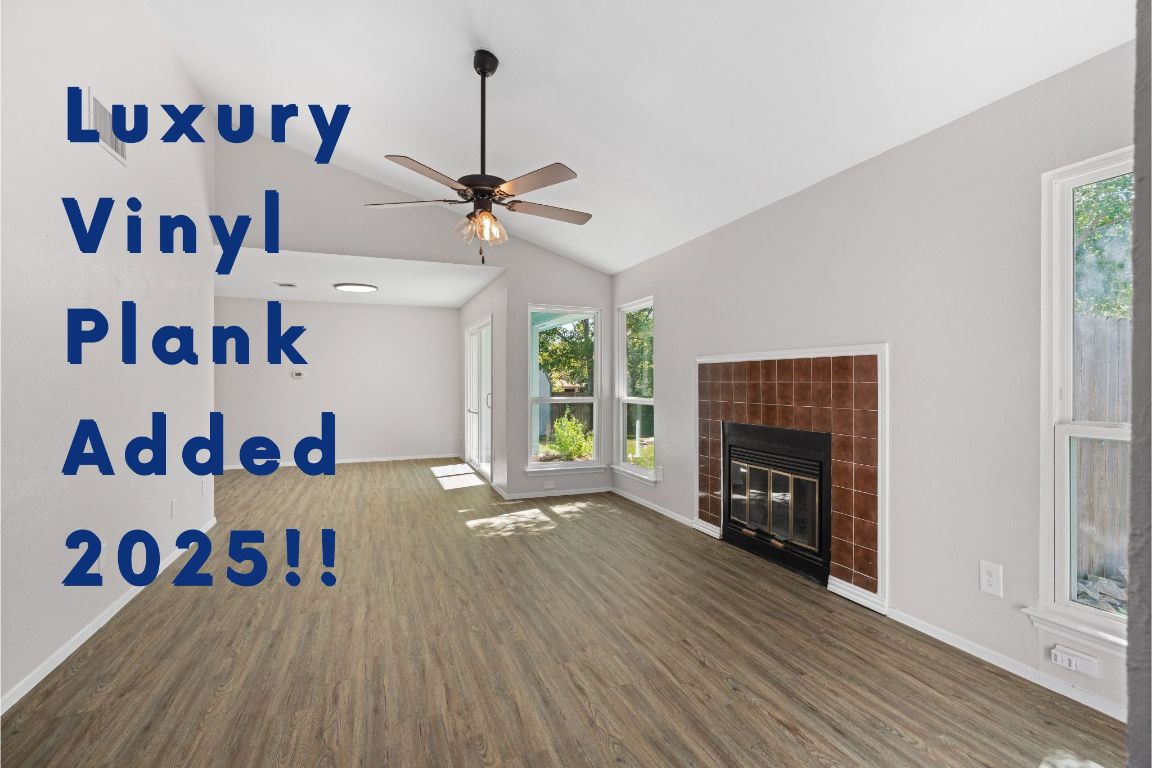 a view of livingroom with furniture and fireplace