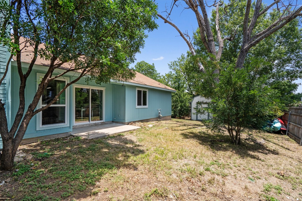 8615 Croydon Loop Austin, TX 78748 - Photo 21 of 28 front view of a house with a yard