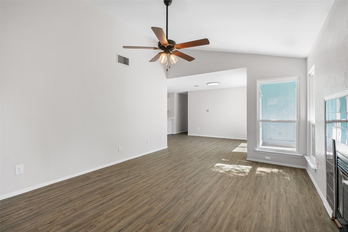 8615 Croydon Loop Austin, TX 78748 - Photo 4 of 28 wooden floor in an empty room with a window