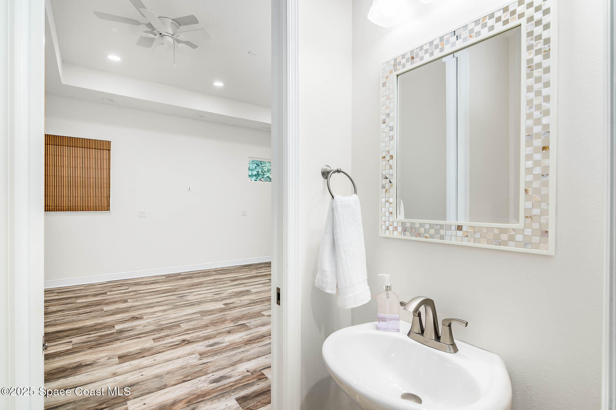 287 Baker Road Melbourne, FL 32934 - Photo 28 of 76 En- suite half bath